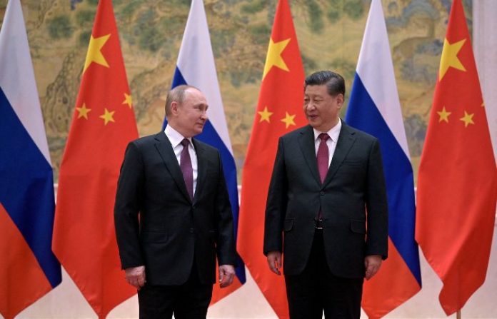 reunioxn_entre_putin_y_xi_jinping.jpg_621823920