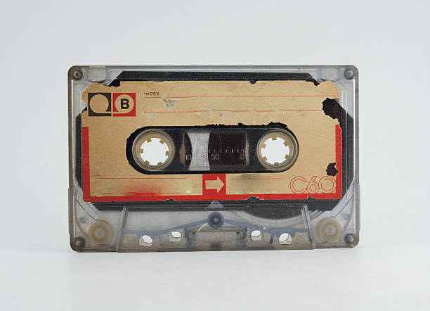 Old audio tape on white backgroundOld audio tape on white background